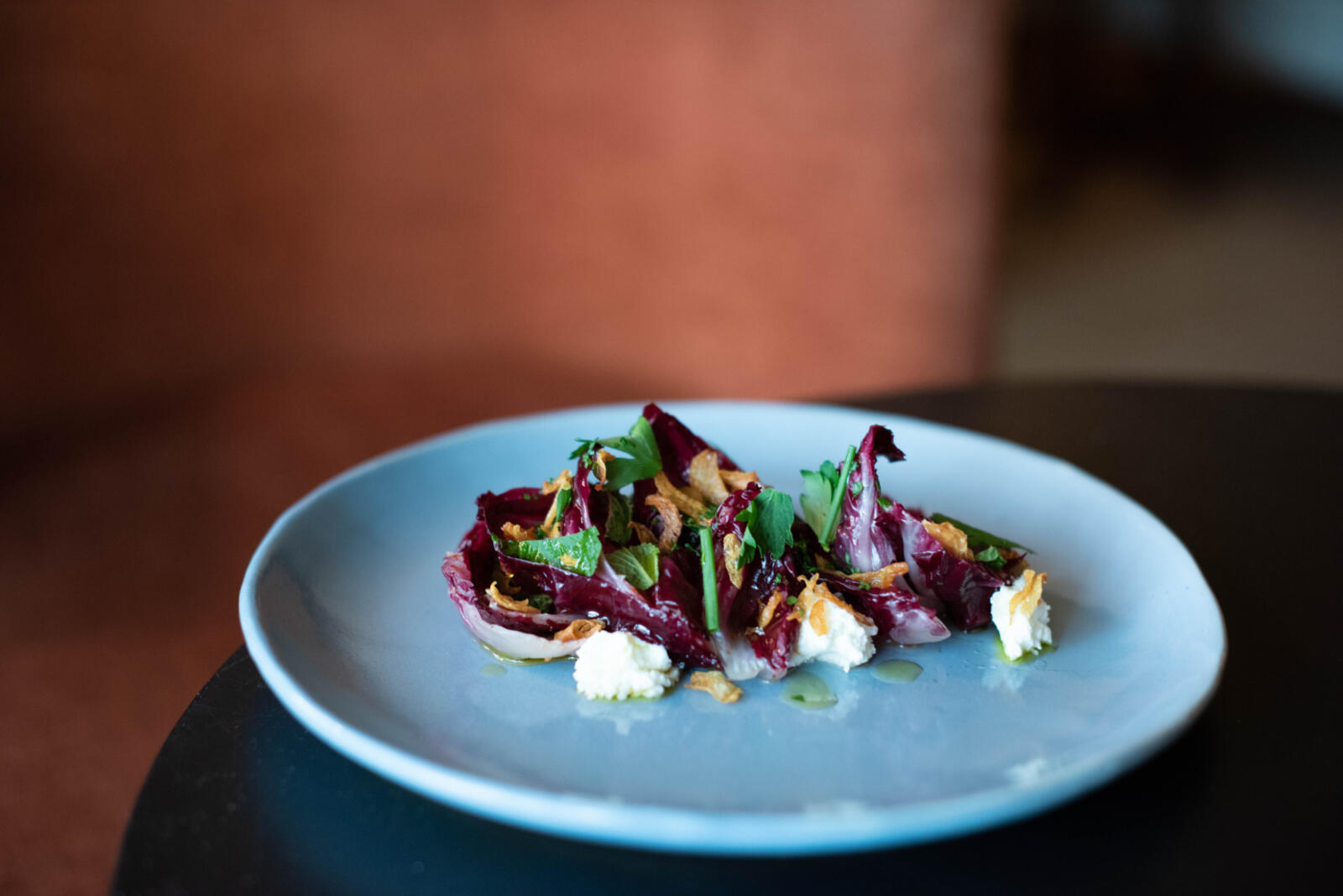 Marinated Radicchio with Brebis and Crispy Garlic Chips, Executive Chef Sarah Steffan