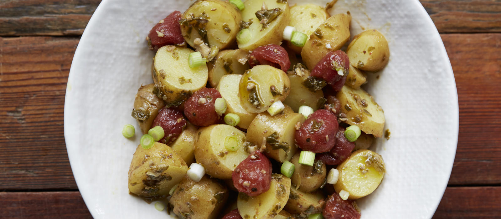 New Potato Salad with Blackberry Farm Tiny Tomatoes and Basil Pesto
