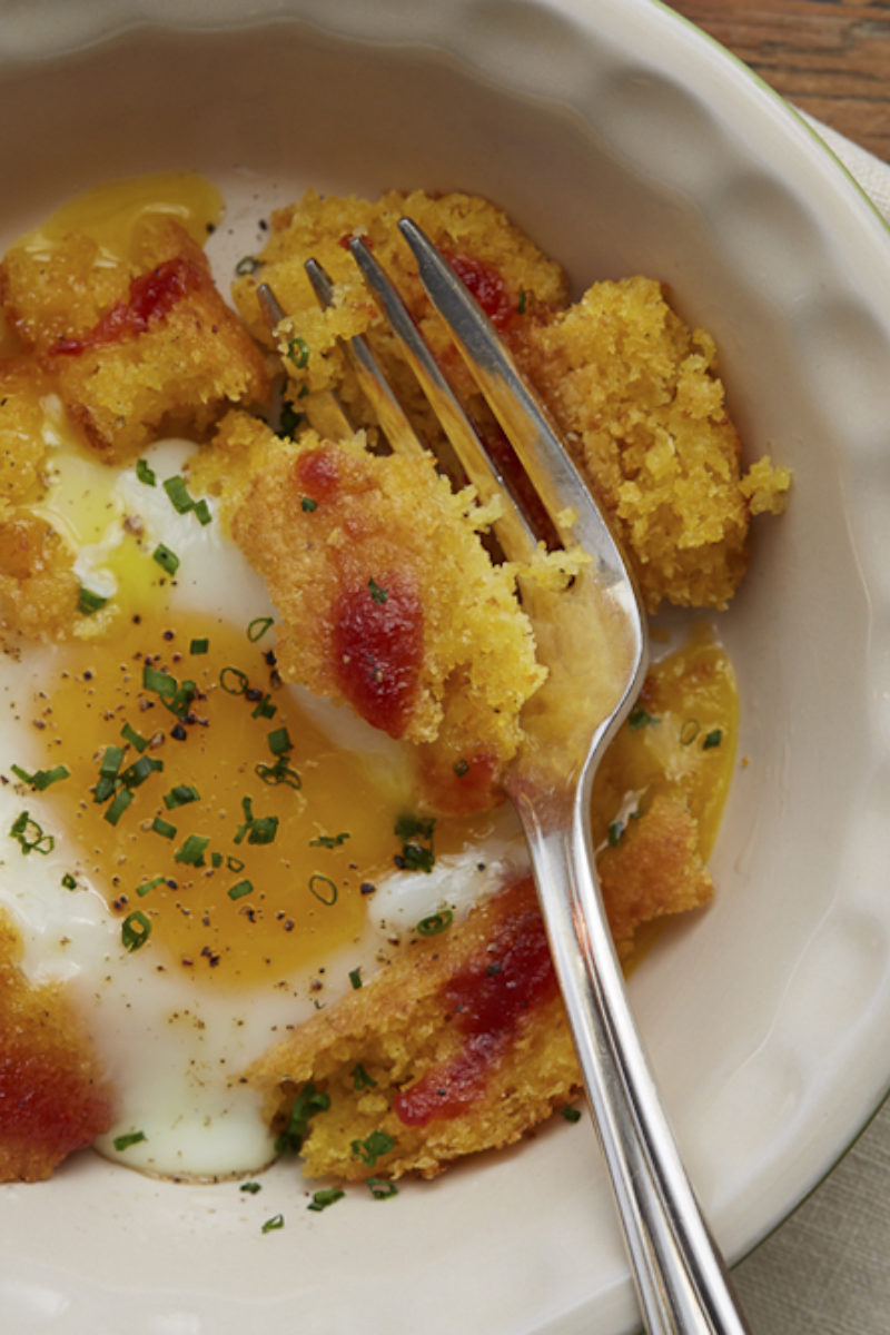 Baked Eggs with Blackberry Farm Tomato Jam and Toasted Cornbread